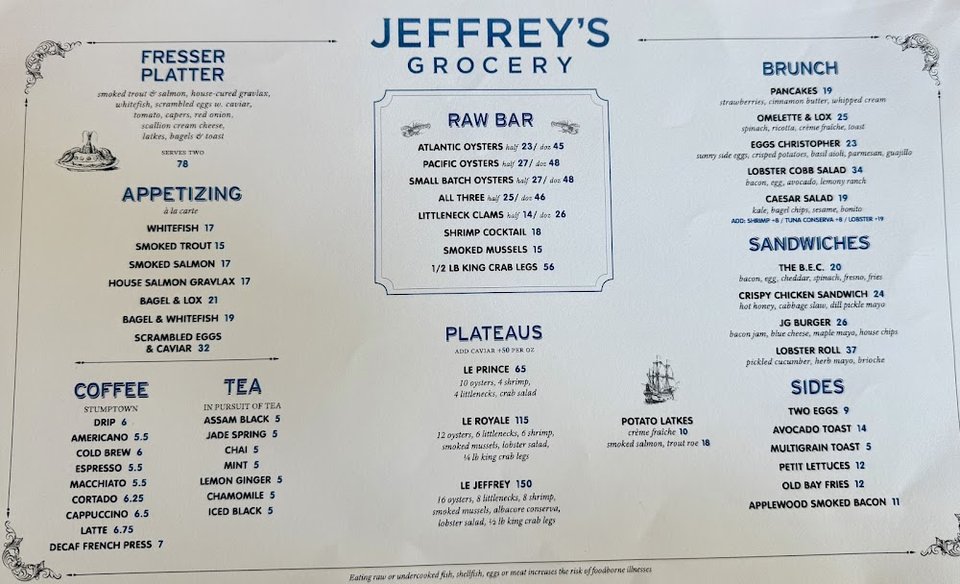 Menu page with salads, sandwiches, and raw bar